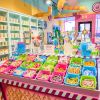 Interior of bright and colorful candy and cotton candy at Belmont Holy Angels Cotton Candy Factory