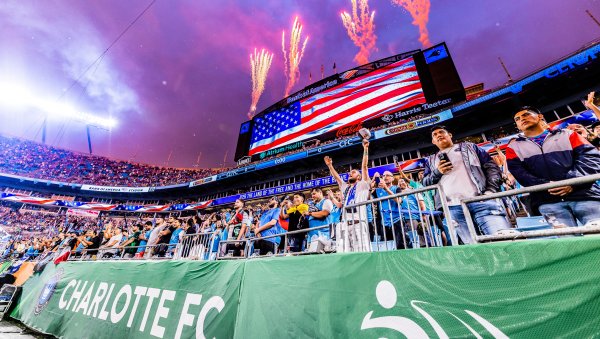 Fireworks going off above stadium with fans in foreground of Charlotte FC vs Chelsea FC