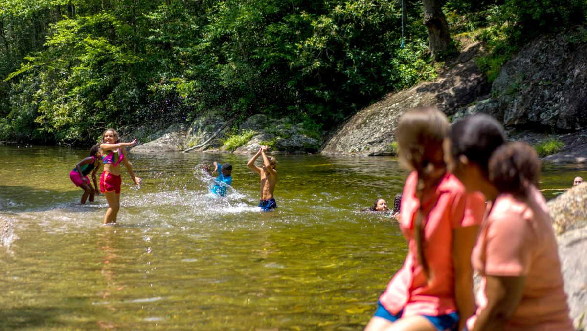 1940s THREE BOYS OUTDOOR IN SWIMMING HOLE - Stock Photo