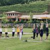 Group of people doing yoga outside of Linville Falls Winery during daytime