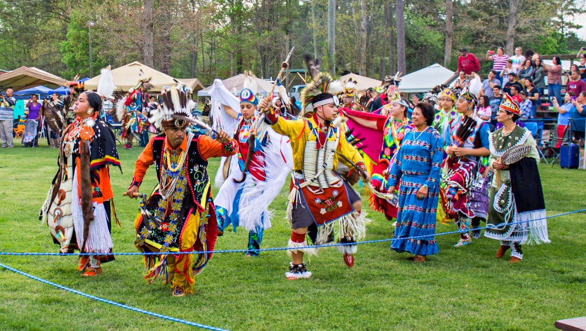 Dancers in field at Blooming of the Dogwood Powwow