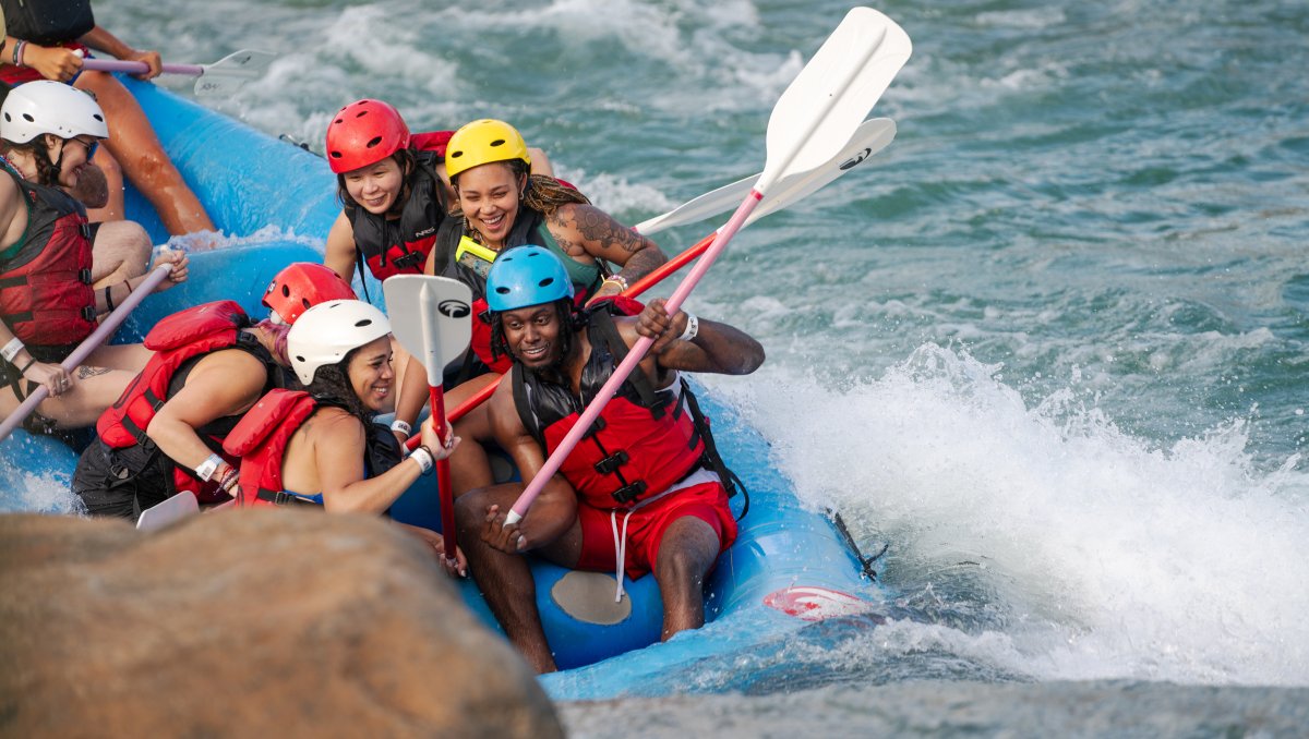 People rafting on whitewater river at US National Whitewater Center