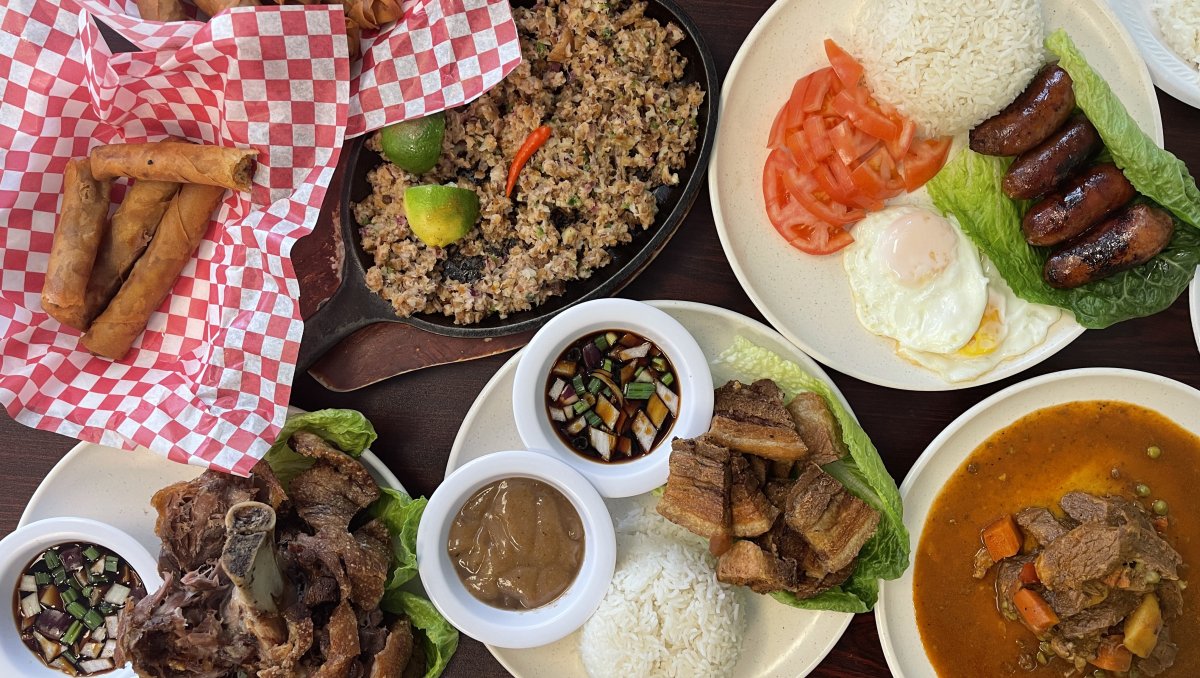 Overhead of plates of different international foods