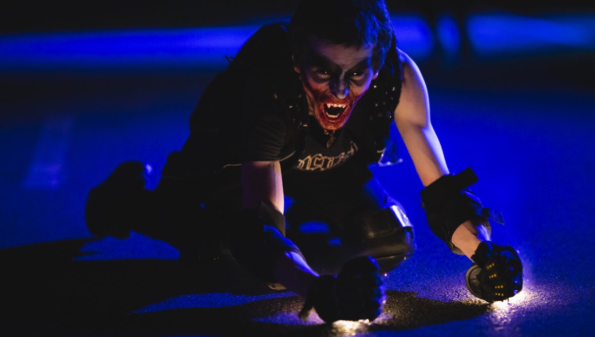 Spooky actor on ground at Scarowinds at Carowinds