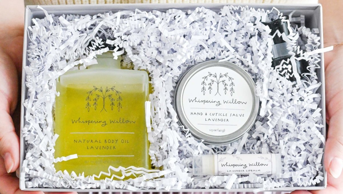 Closeup of bath products in a gift box.