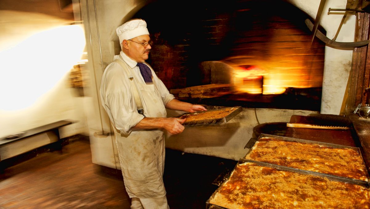 baker in the kitchen of Winkler Bakery in Winston-Salem