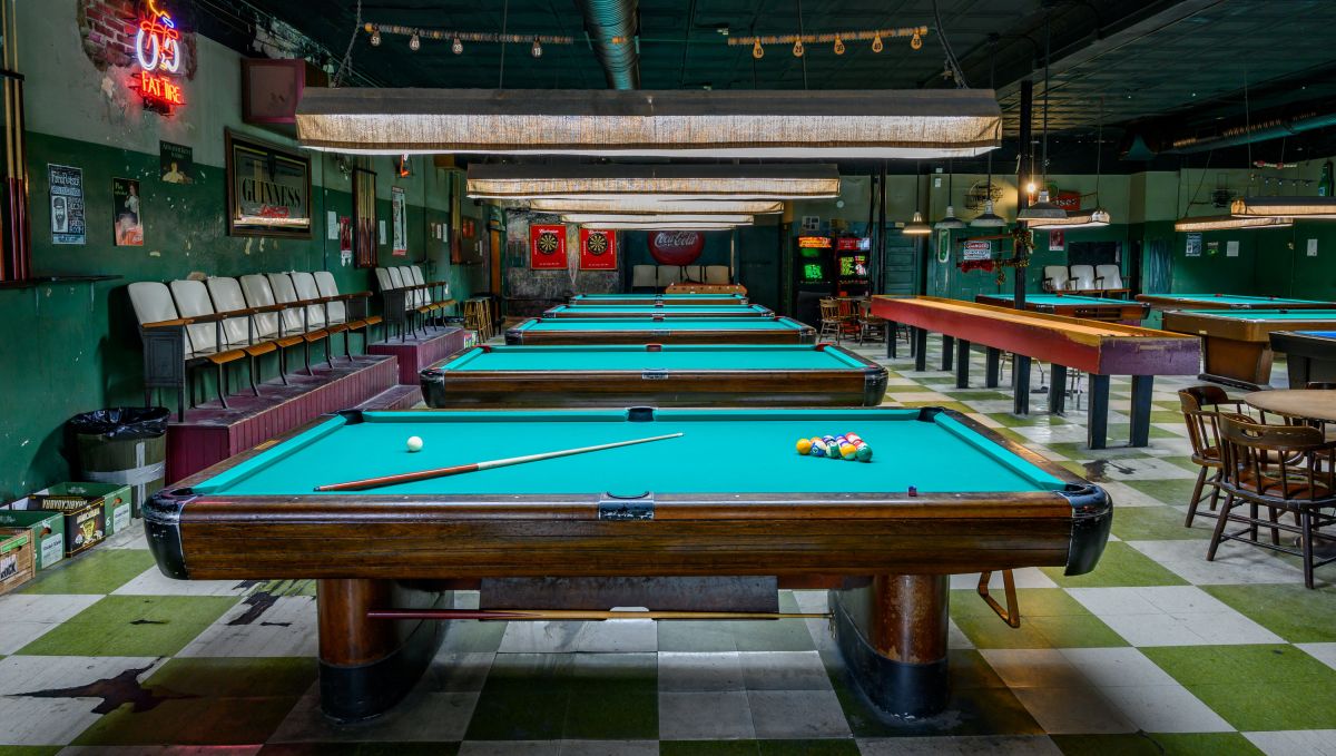 Row of pool tables at The Green Room bar in Durham